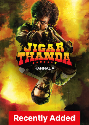 Netflix: Jigarthanda DoubleX (Kannada) | <strong>Opis Netflix</strong><br> In the 1970s, an unlikely filmmaker teams up with a notorious gangster with a passion for Hollywood Westerns and dreams of being a star. | Oglądaj film na Netflix.com